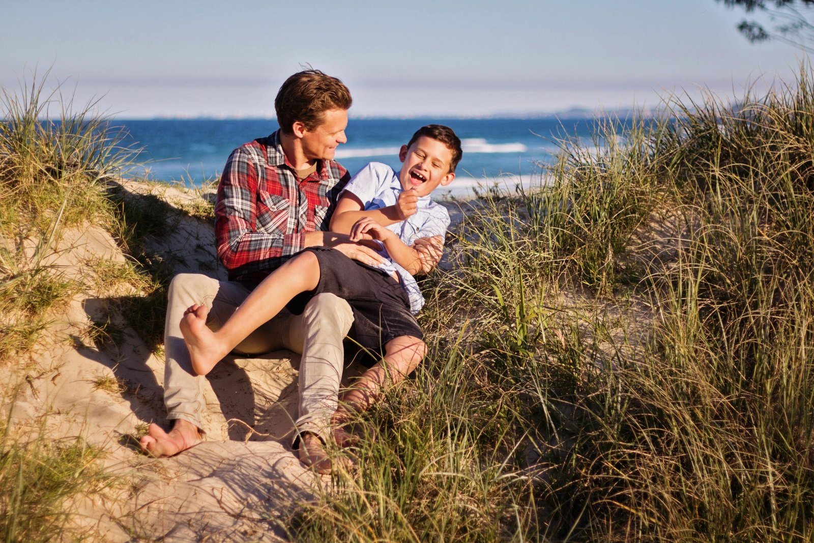 Happy family enjoying spacious Wildwood beach vacation rental in Jersey Shore for a memorable getaway.