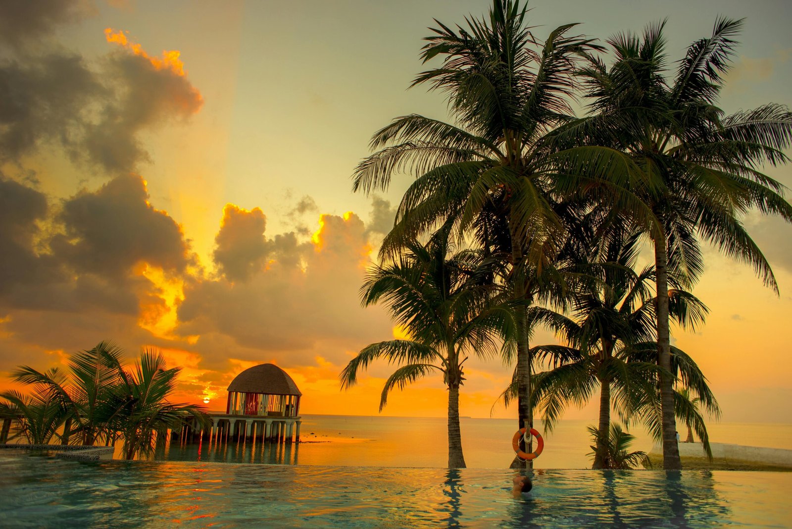 Breathtaking South Padre Island beach at sunrise or sunset, showcasing the golden sand, serene ocean waves, and vibrant sky, ideal for Texas coastal photography and travel inspiration.