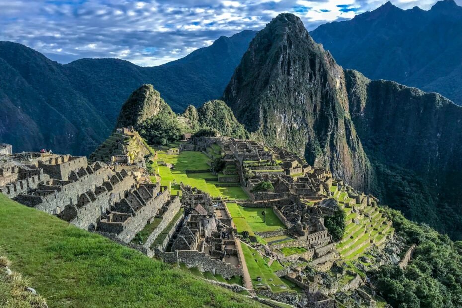 Panoramic view of South America's diverse landscapes, featuring iconic destinations like Machu Picchu, Patagonian mountains, and vibrant city life, embodying adventure travel inspiration.