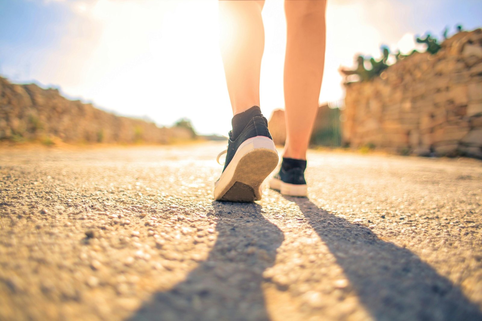 Comfortable travel shoes on a person walking and exploring a scenic destination, emphasizing versatile footwear for sightseeing and adventure.