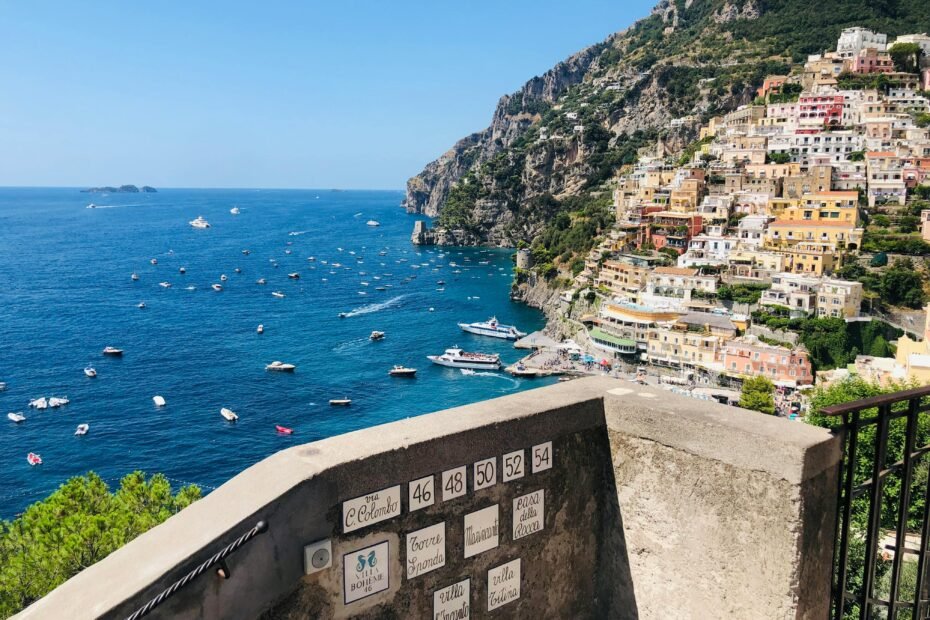 Scenic view of the colorful cliffside village of Positano on the Amalfi Coast, one of the best Europe places to see for an unforgettable vacation.