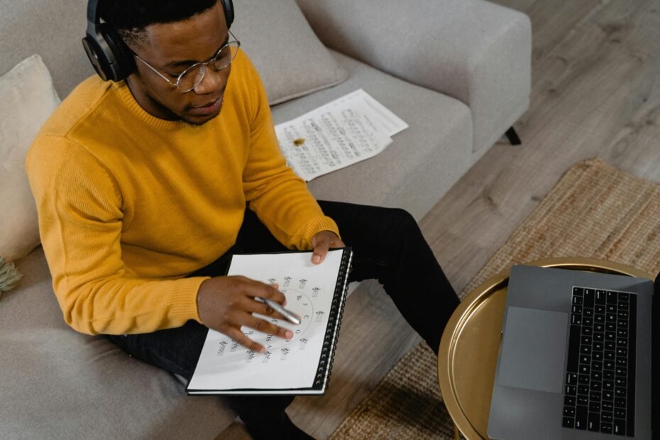 A person sits in a quiet room, carefully reading RI escort reviews on a laptop to ensure a safe and verified experience.