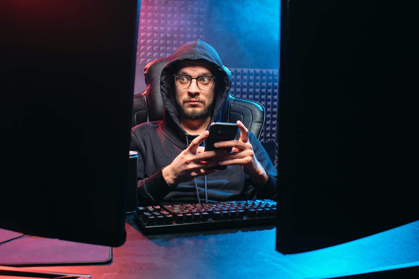 A conceptual image of a person at a computer with a warning symbol, illustrating the cybersecurity risks and dangers of searching for sensitive content online.
