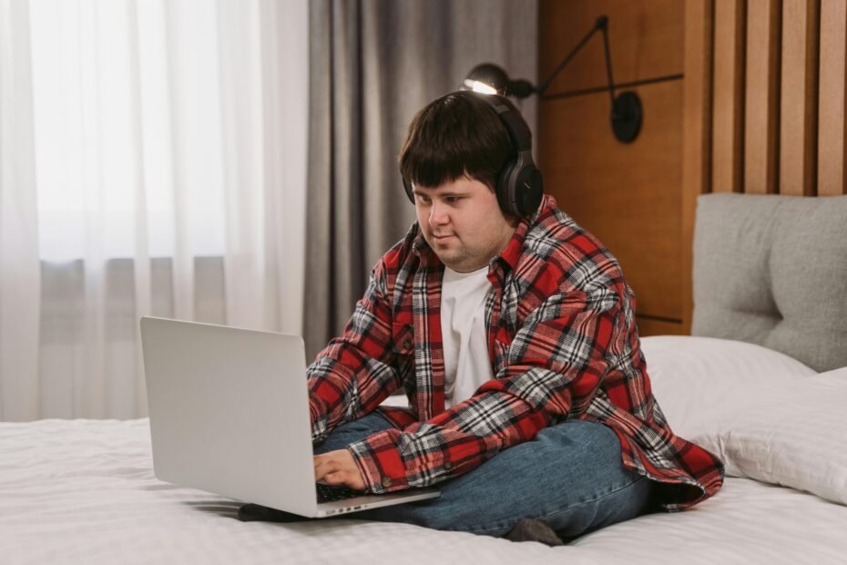 A user safely browsing on a laptop to find and explore Pornhub Reddit communities and discussions, following a guide for online safety.