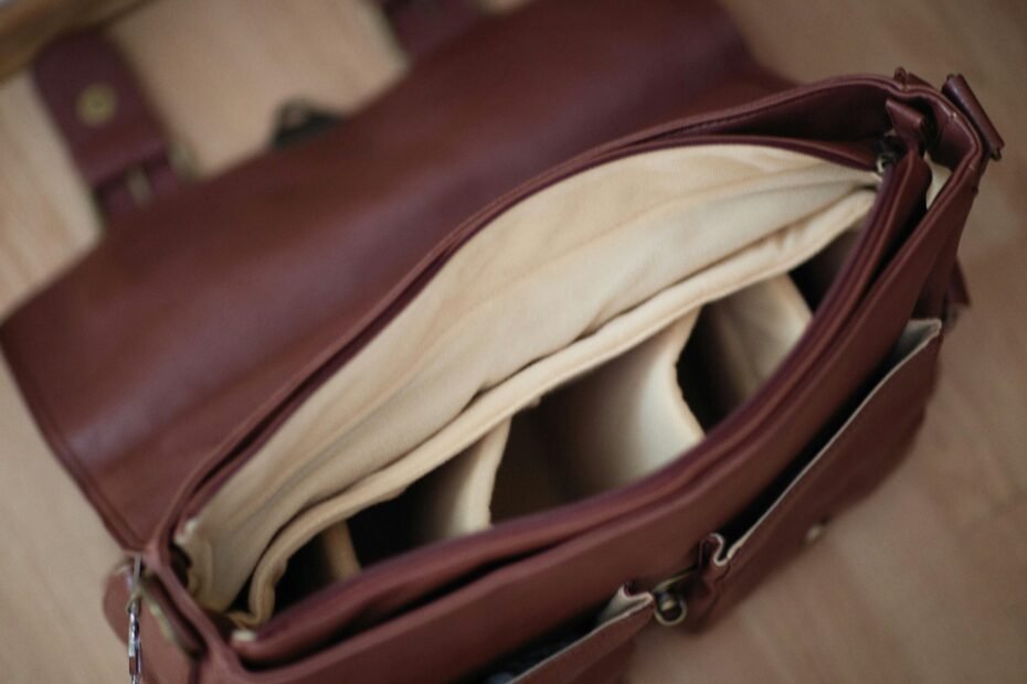 Leak-proof travel soap case in an organized toiletry bag for hygienic and convenient packing of a bar of soap.