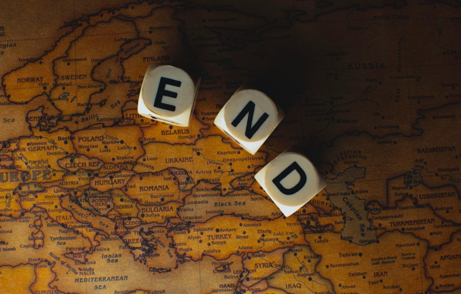 Travel-themed games with a controller and board game pieces on a world map, symbolizing virtual journeys, global exploration, and adventures for gamers seeking wanderlust from home.