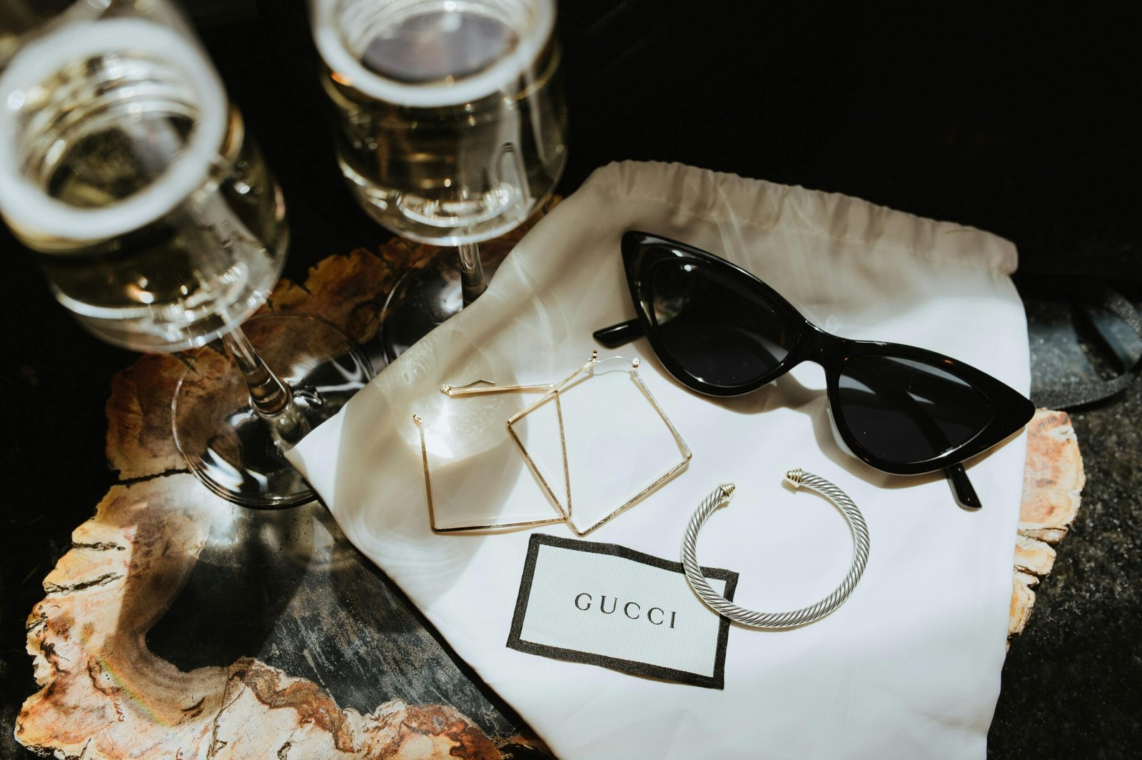 Gucci GG Supreme duffle bag carried by an elegant traveler in a high-end airport, showcasing iconic style, luxury travel, and superior quality.