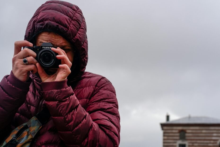 Stylish woman wearing a versatile, waterproof, and packable travel jacket with secure hidden pockets, ideal for women seeking comfort and peace of mind on their travels.