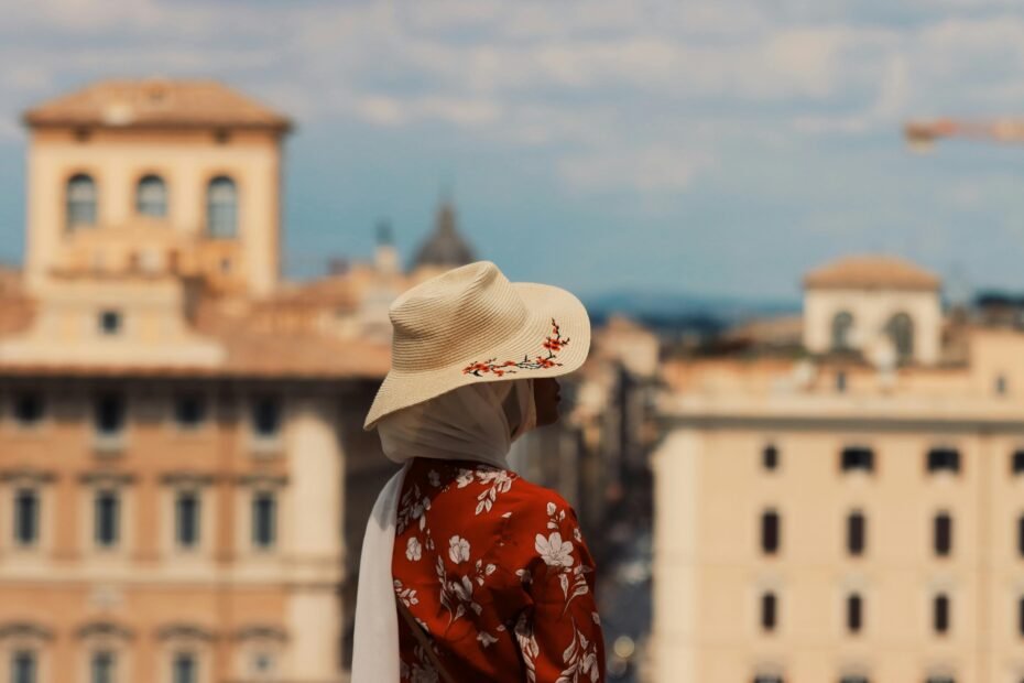 Stylish woman wearing a comfortable, versatile women's travel dress while exploring a scenic destination, perfect for light and smart packing.