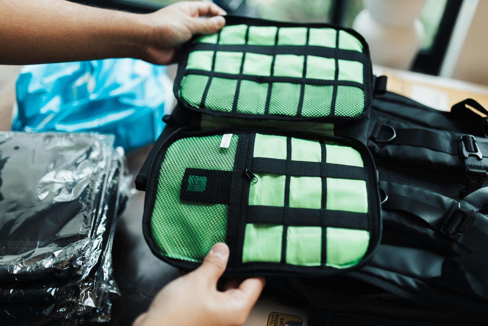 Packing cubes organizing clothes inside an open suitcase for efficient and space-saving travel.