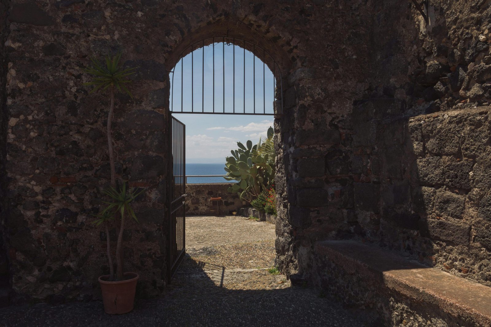 Panoramic view of Sicily's iconic historic coastline featuring ancient ruins and the shimmering Mediterranean Sea, representing an unforgettable travel adventure.