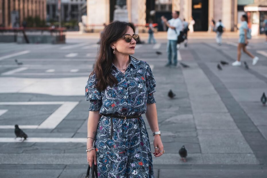 Stylish woman confidently exploring a city with a modern anti-theft crossbody travel purse, highlighting secure and functional travel bags for women.