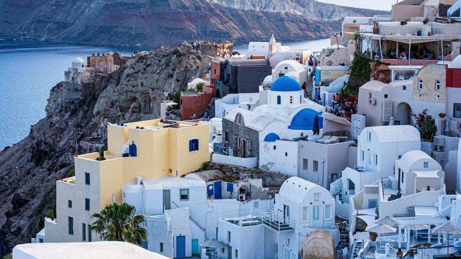 Classic 10-day Greece travel itinerary featuring iconic landmarks: Athens Acropolis, Mykonos windmills, and Santorini caldera sunset.