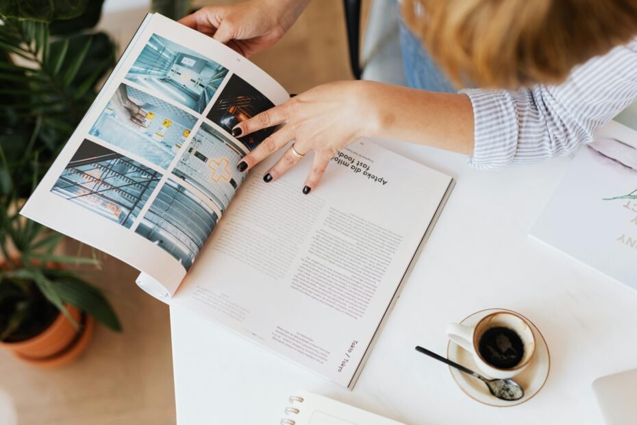 Open travel magazine on a coffee table, inspiring wanderlust and trip planning for future adventures and destinations. Guide to the best travel magazine subscriptions.