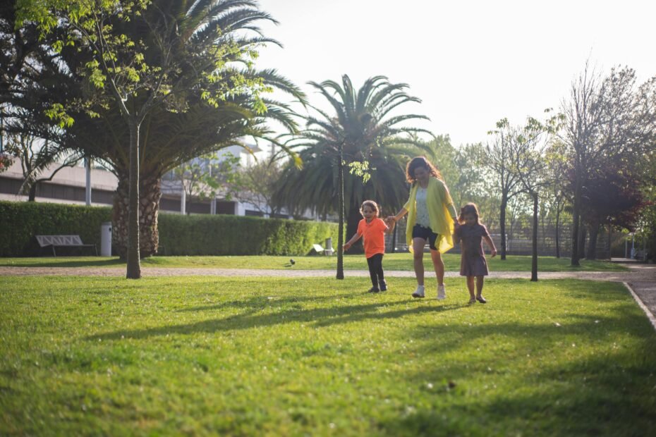 Happy family with children enjoying a spring break vacation on a beach or in nature, symbolizing stress-free family travel.