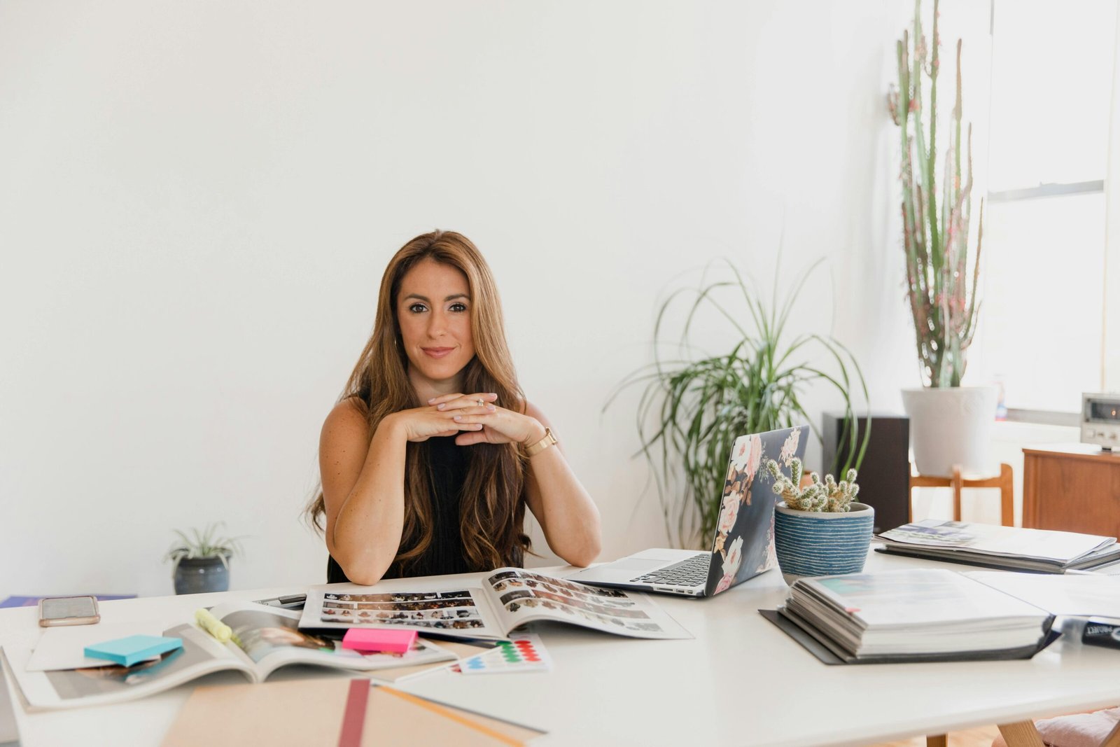 Traveler calmly organizing essential documents and submitting an Aon travel claim online, demonstrating a stress-free process for travel insurance claims and quick resolution after a disruption.