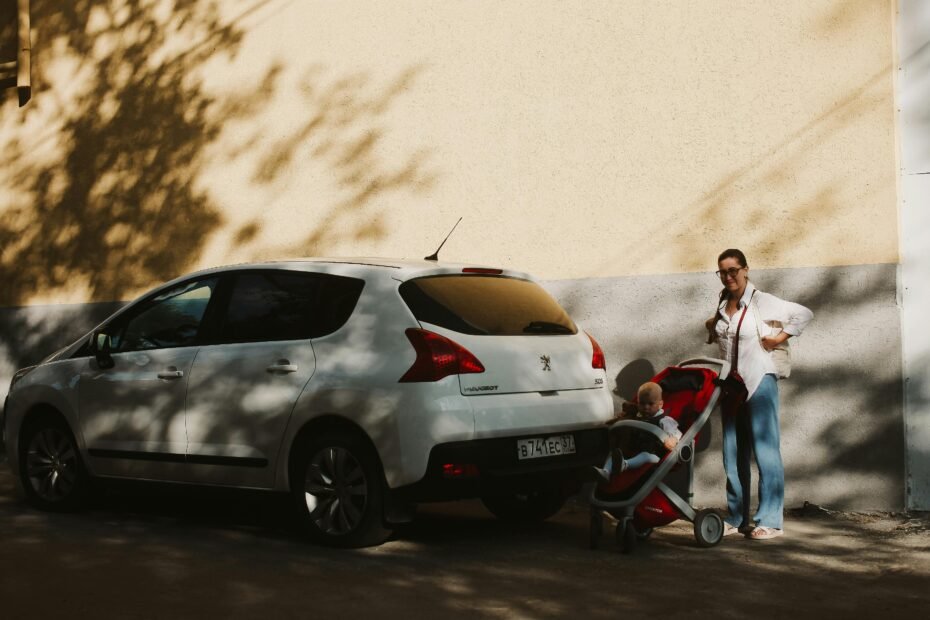 Joie Ginger and Rue travel system with i-Snug 2 i-Size car seat and lightweight Rue stroller, ideal for new parents navigating city life with ease and safety.