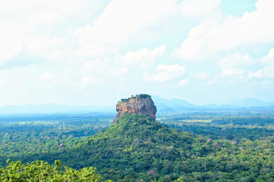A panoramic view capturing Sri Lanka's stunning blend of ancient cultural sites, vibrant natural landscapes, and tranquil beaches, symbolizing unforgettable adventure travel experiences and customized tours offered by Tourstro.com.