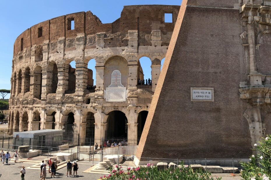 Panoramic view of Rome, Italy, featuring iconic landmarks like the Colosseum with smiling tourists, representing comprehensive Rome travel packages and easy vacation planning.