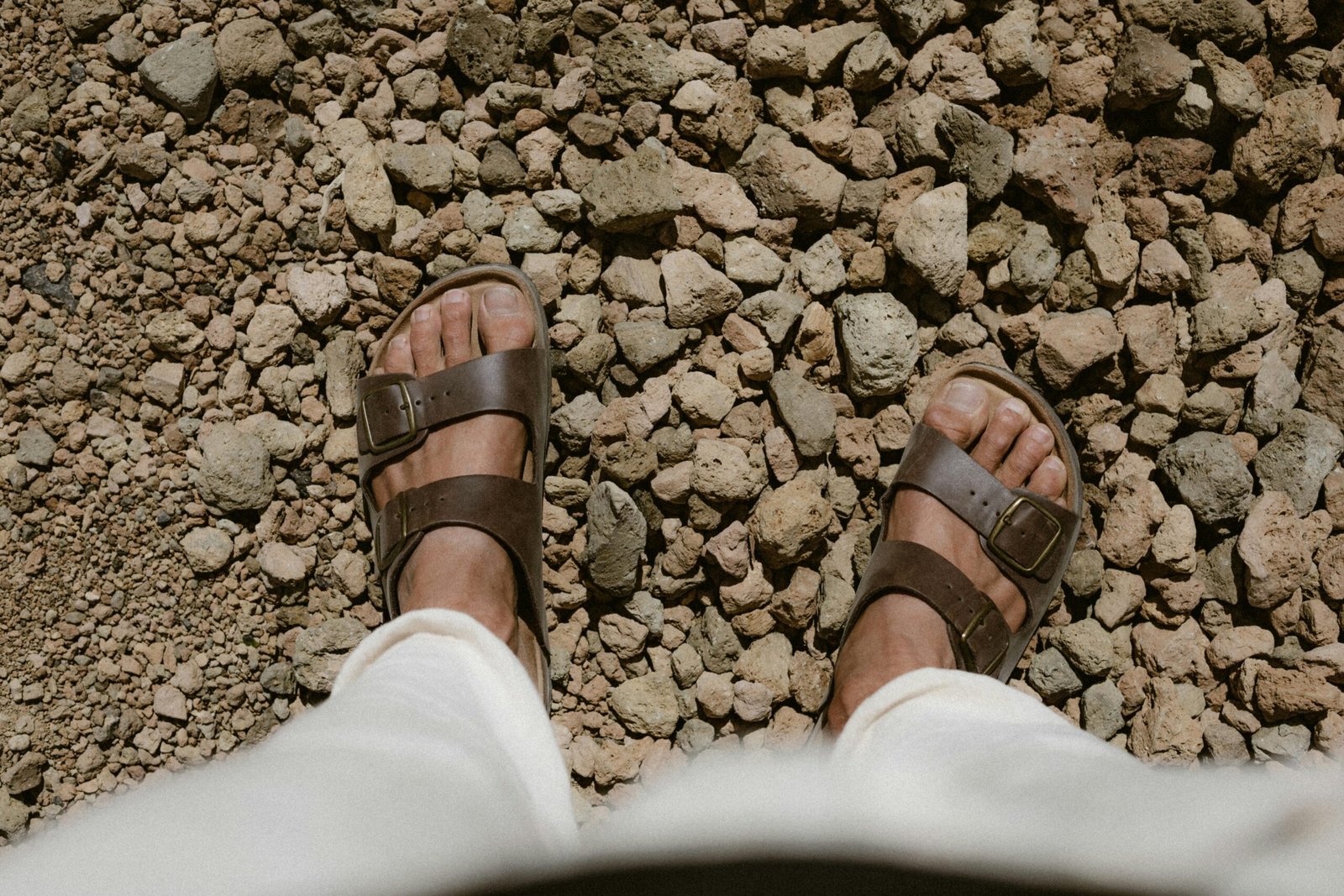 Comfortable and stylish travel sandals designed for diverse adventures, providing support and durability for exploring cities, hiking trails, and relaxing on beaches.