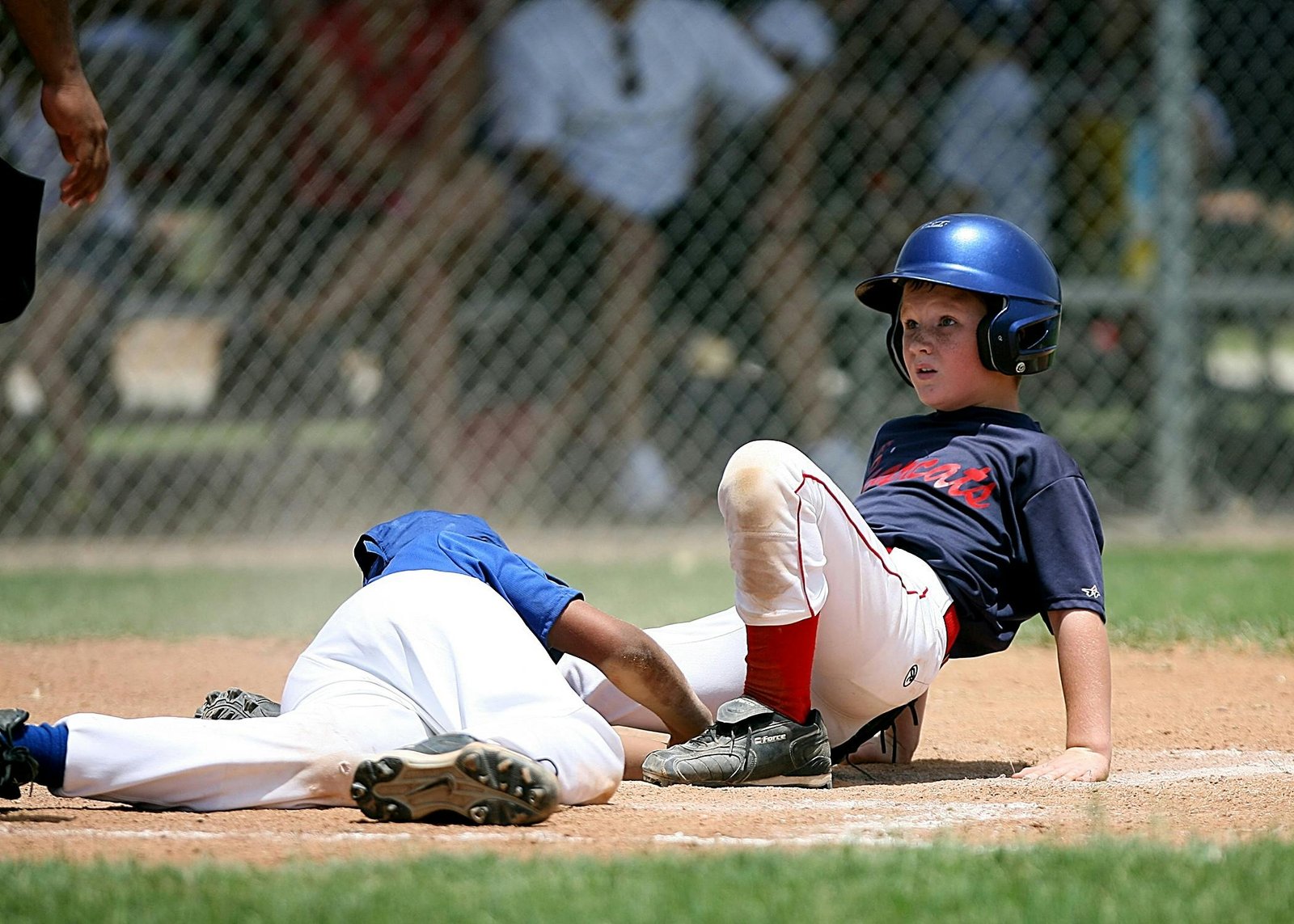 Young baseball players in action on a field, representing the competitive Aquasox travel baseball program focused on skill development and high-level play.