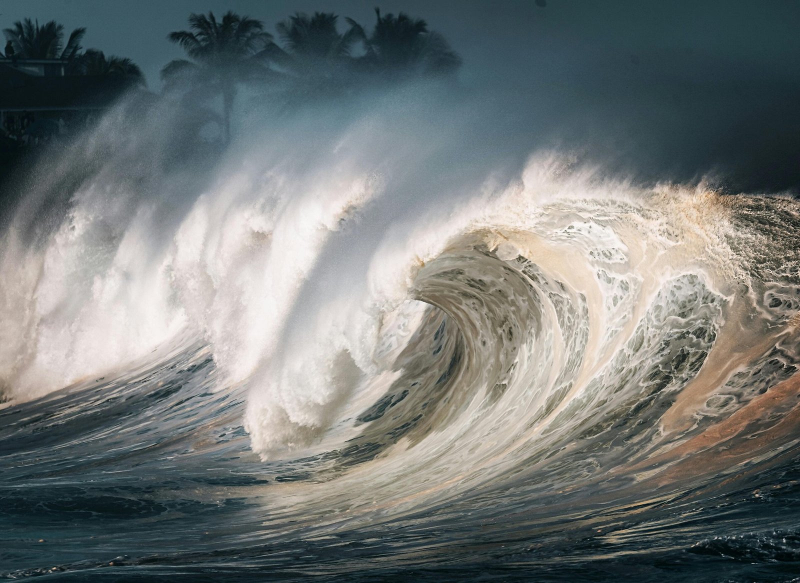 Illustration of a massive tsunami wave traveling at incredible speed across the deep ocean, demonstrating its destructive power and transformation in shallow coastal waters as it approaches land.