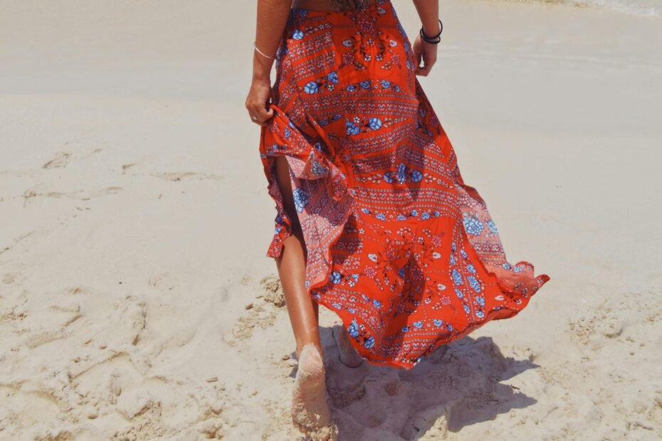 A woman confidently exploring a scenic travel destination, dressed in a versatile, comfortable, and practical travel skirt, perfect for active adventures and packing light.