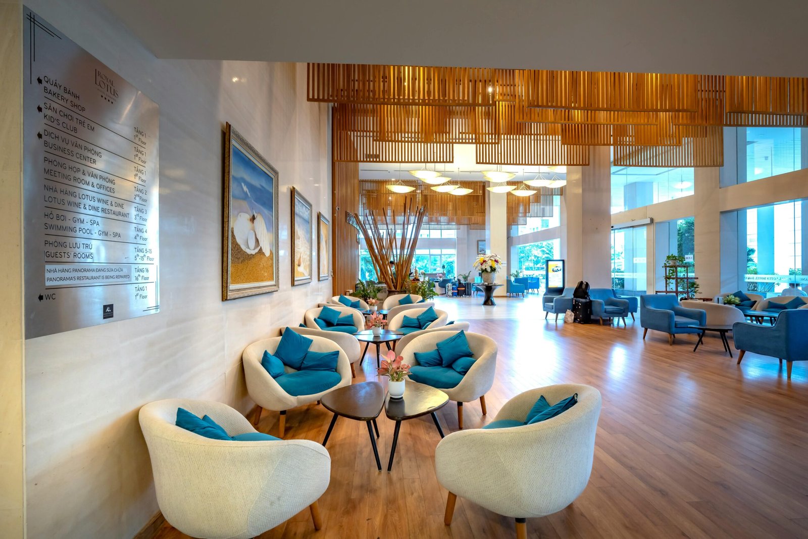 A modern, well-lit South Midway Travel Plaza at dusk, showcasing multiple fuel pumps, a convenience store entrance, and spacious parking for vehicles, signaling a comprehensive highway rest stop for road trip travelers.