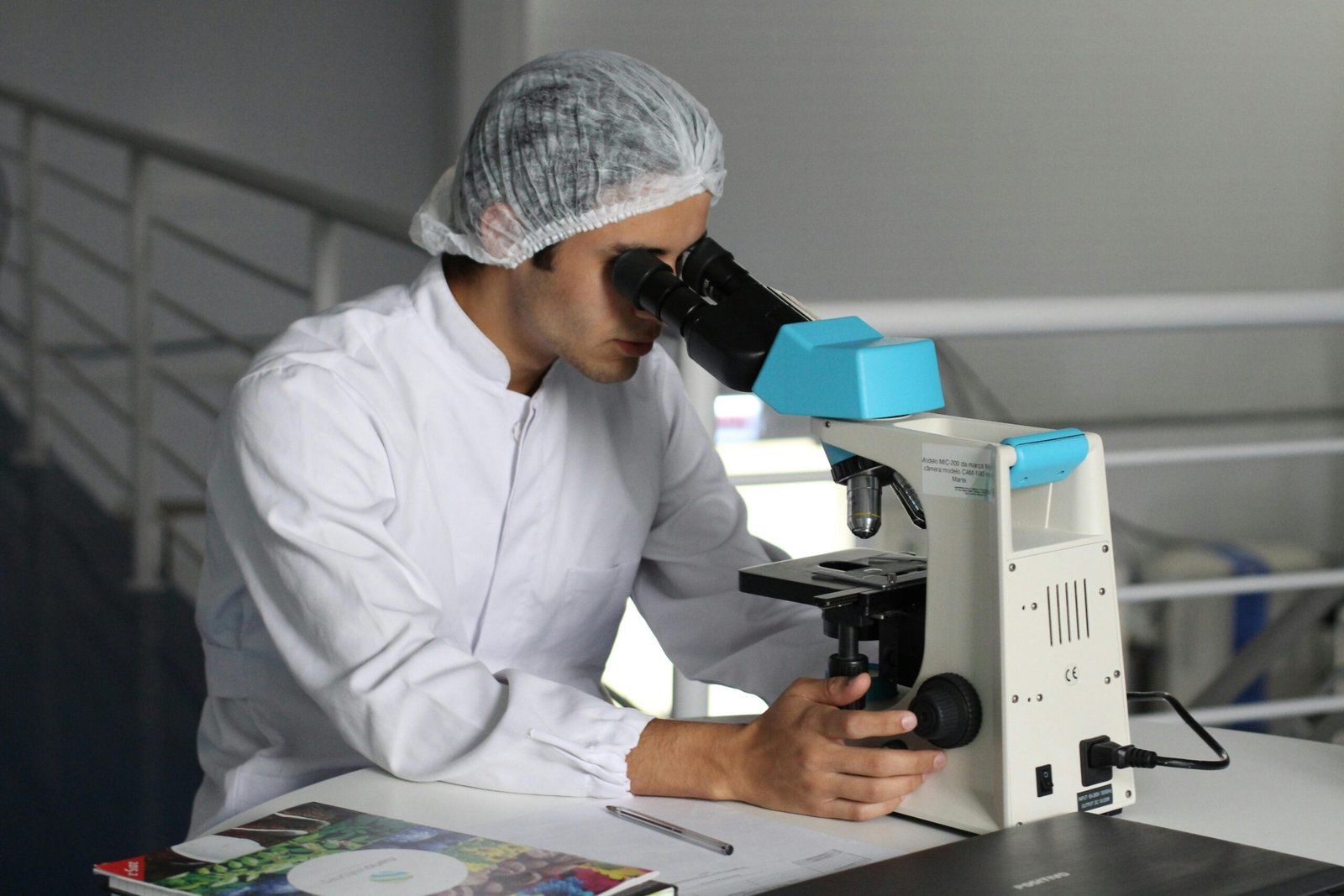 A confident medical laboratory technician (MLT/MLS) standing in a modern lab with a blurred background hinting at travel, symbolizing the professional and personal growth available through travel lab tech jobs.