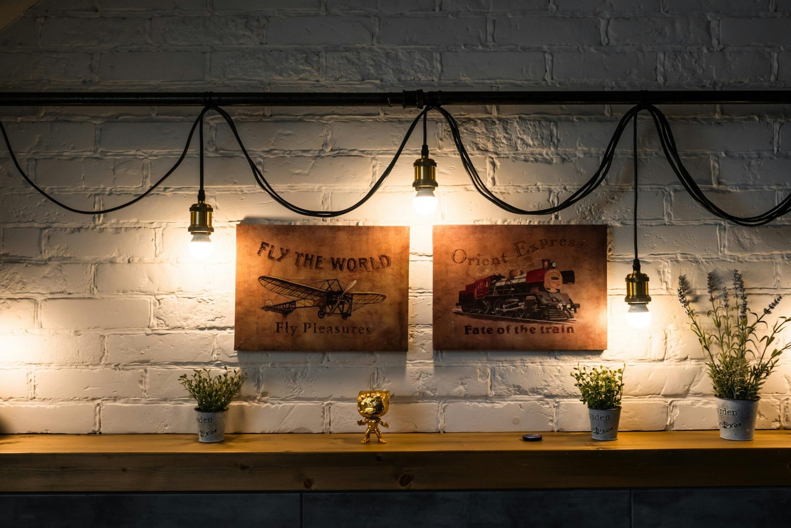 A curated gallery wall featuring various vintage travel posters, including Art Deco and Mid-Century Modern styles, enhancing modern home decor and inspiring wanderlust.