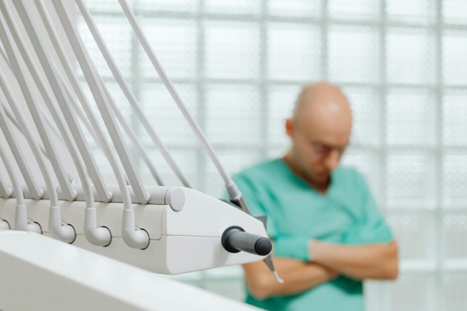 A traveling sterile processing technician meticulously inspecting surgical instruments in a modern hospital setting, symbolizing a dynamic healthcare career offering professional growth and travel opportunities across the country.