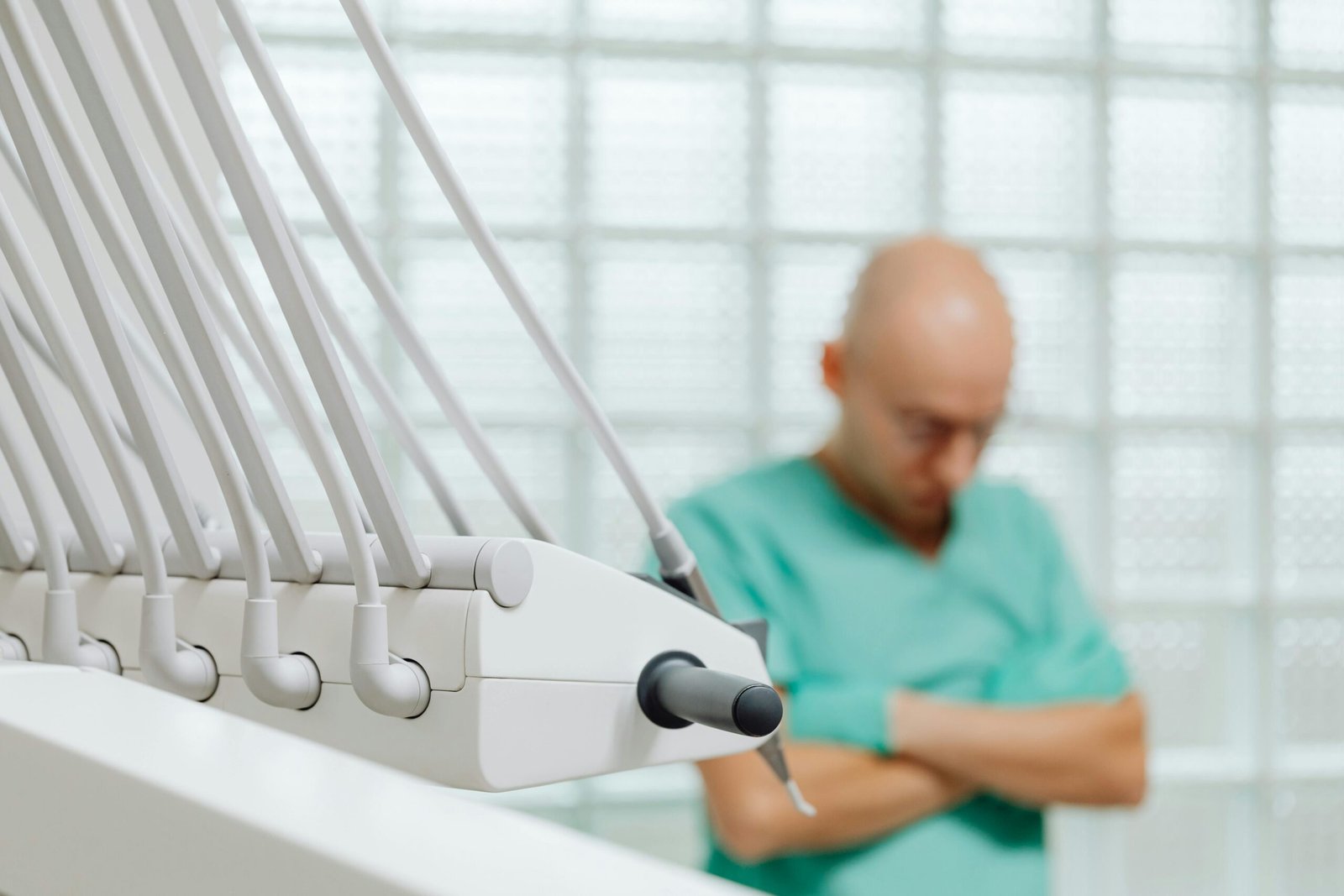 A traveling sterile processing technician meticulously inspecting surgical instruments in a modern hospital setting, symbolizing a dynamic healthcare career offering professional growth and travel opportunities across the country.