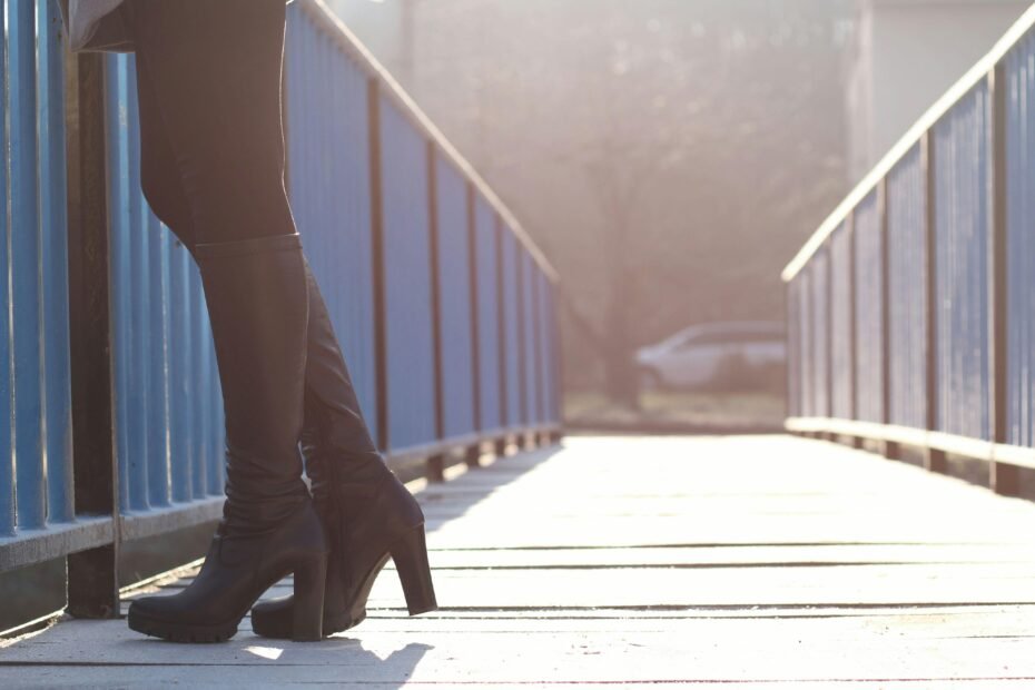 A traveler's feet wearing comfortable and stylish walking shoes on a historic European cobblestone street, emphasizing the best footwear for pain-free exploration and memorable European trips.