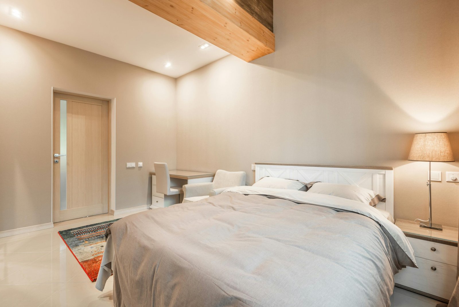 Clean and comfortable Travel Inn hotel room interior with a cozy bed and essential amenities, highlighting affordable and convenient lodging for value-focused travelers.