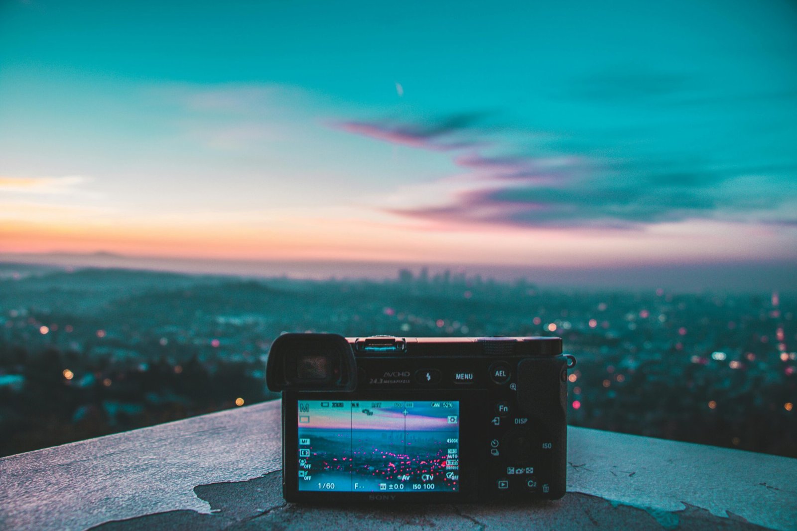 A smiling radiologic technologist, representing a travel x-ray tech, stands confidently with a vibrant city skyline in the background, embodying the adventure, flexibility, and professional growth of a mobile medical imaging career.