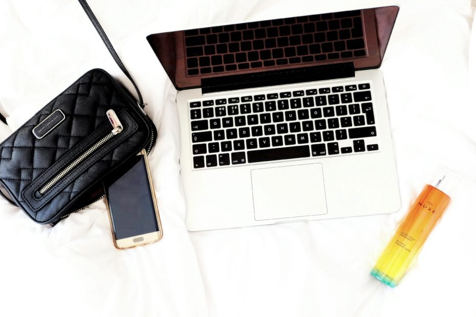 Stylish traveler placing a compact, luxurious Valentino travel perfume bottle into a chic carry-on bag, ready for a sophisticated and TSA-friendly getaway.