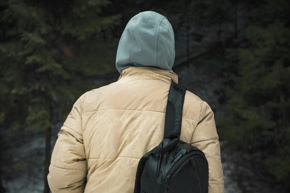 Best men's waterproof travel backpack for modern adventurers, ensuring gear protection and stress-free travel in any weather.