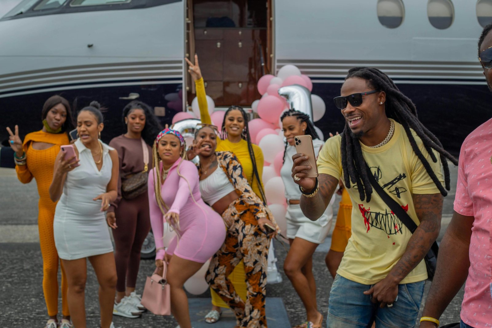 Group of happy employees on a luxury incentive travel trip, celebrating business success and team motivation through a corporate reward program.