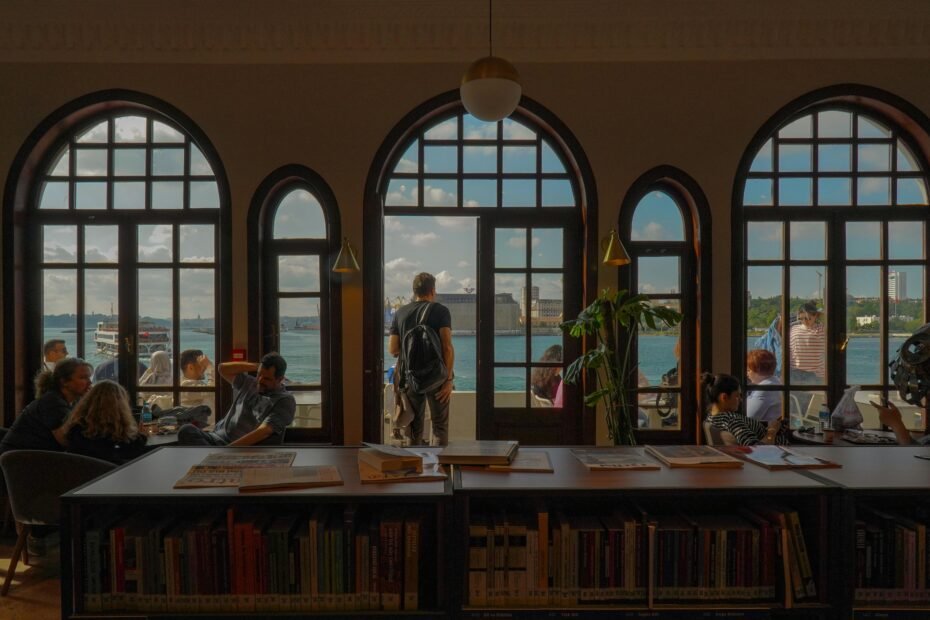 Modern interior of Ulster Travel Plaza on NYS Thruway, featuring spacious seating, diverse food options, and travelers enjoying a comfortable, clean rest stop experience.