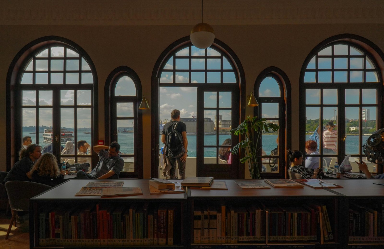 Modern interior of Ulster Travel Plaza on NYS Thruway, featuring spacious seating, diverse food options, and travelers enjoying a comfortable, clean rest stop experience.