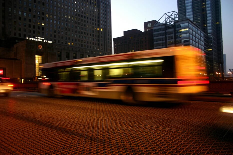 Golden Gate Sparks Travel Plaza at night, a bustling, well-lit interstate 80 truck stop and travel center in Sparks, Nevada, with diverse vehicles and amenities.