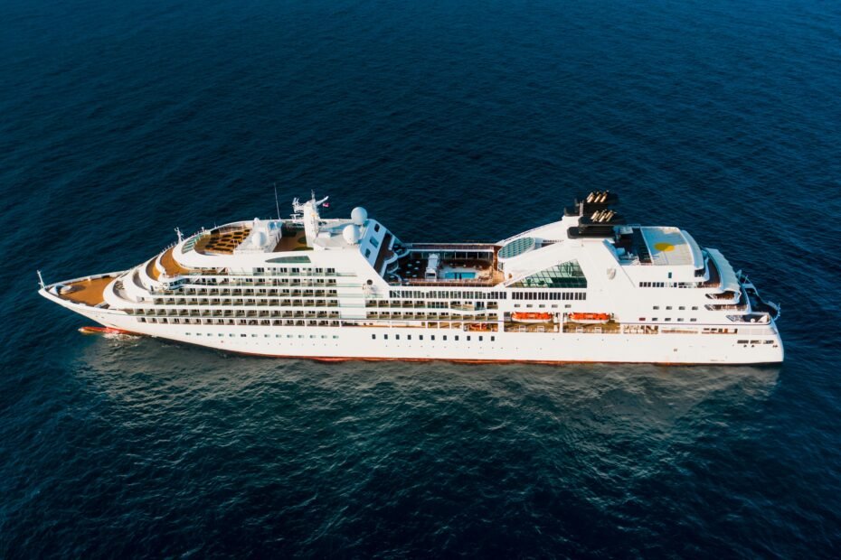 Modern cruise ship sailing on the open ocean, showcasing its steady and comfortable cruising speed for efficient global travel.