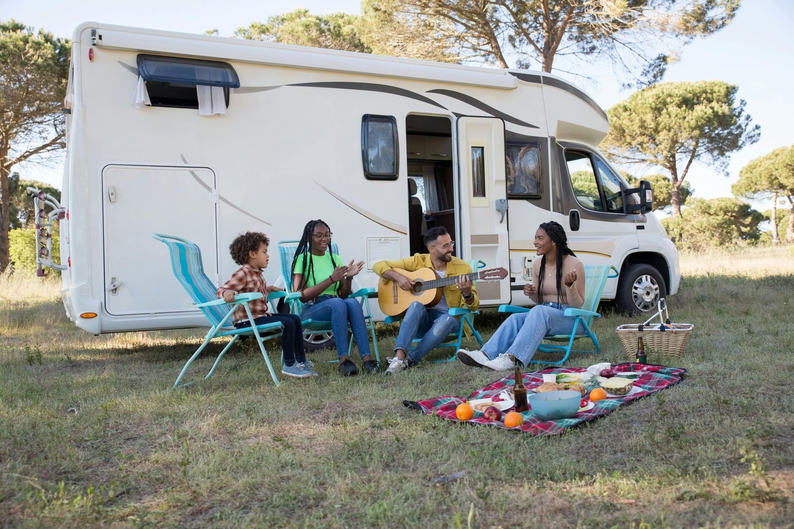Family safely using stable, upgraded travel trailer steps to enter an RV at a sunny campsite, emphasizing comfort and security for camping.